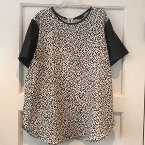 Leather sleeve black and white printed top